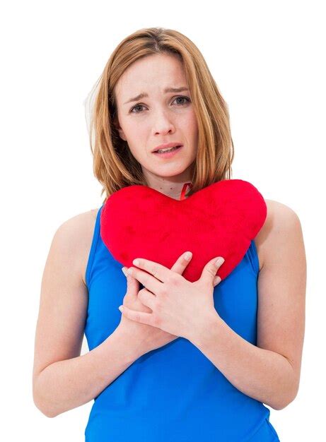 Premium Photo Beautiful Woman With Heart Shape Pillow Against White