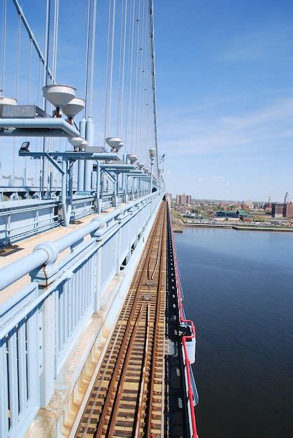 Premium Photo Bridge Over River Against Sky