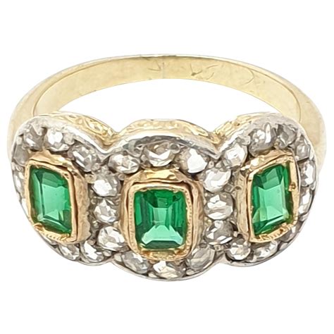 Classic Antique Emerald Diamond Cluster Ring at 1stDibs