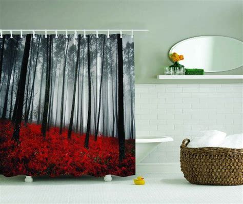 A Bathroom With A Shower Curtain That Has Red Flowers On It And Trees