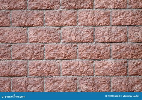 Red Brick Wall With A Gray Cement Background Texture Stock Photo