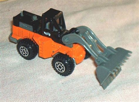 Mattel Hot Wheels CAT WHEEL LOADER 4 Long When Fully