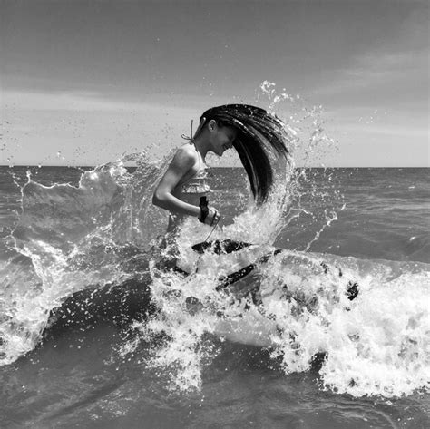 Premium Photo | People surfing in sea