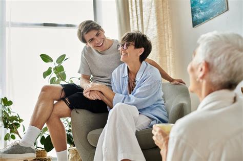 A Joyful Gathering Of A Lesbian Stock Photo Image Of Togetherness Moments