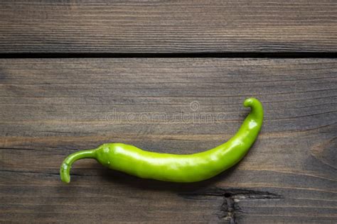 Green Chili Pepper Pod On A Wooden Table Green Chili Pepper Green Pepper On The Table Hot