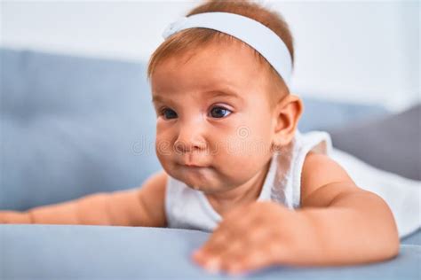 Adorable Baby Lying Down On The Sofa At Home Stock Image Image Of