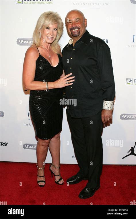 Lisa Fuhr, Grant Fuhr attending the Derek Jeter Celebrity Invitational