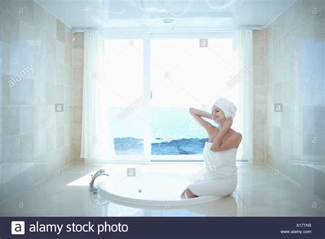Woman Sitting At Edge Of Hot Tub Stock Photos Woman Sitting At Edge Of Hot Tub Stock Images