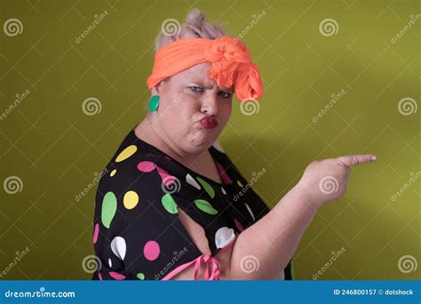 Plus Size Model Woman With Trendy Makeup Fashionable Blonde In Black Short Dress Posing At The