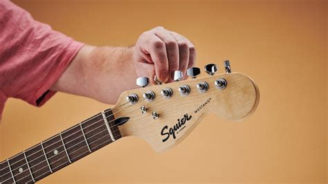 How To Tune An Electric Guitar With A Tuner Guitar World