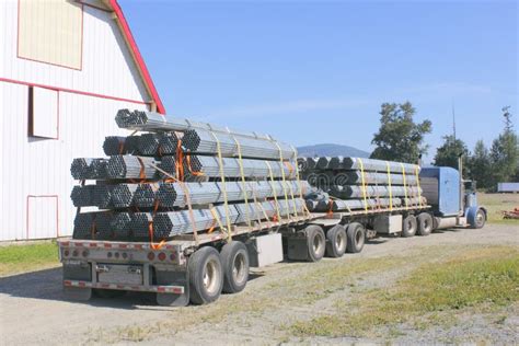 semi trailer hauling pipes  poles stock image image  haul