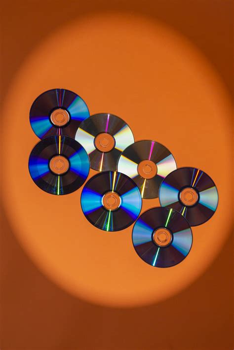 Large Variety Of Arranged Cd Disks Or Dvd Disks On Orange Flickr