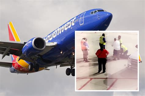 Watch Passenger Opens Emergency Exit And Climbs Onto Wing Of Southwest