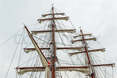 Yards and sails on the standing rigging of a square rigger | Stock ...