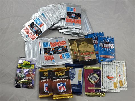 At Auction: Lot of (50) Various Football Card Packs