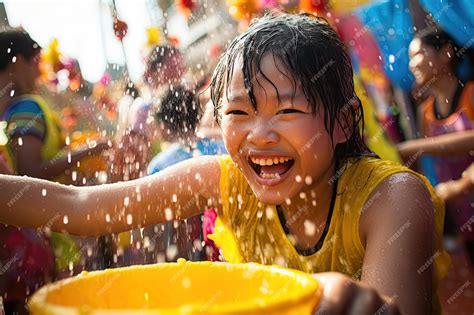 Premium Ai Image Songkran Festival In Thailand Featuring Joyful People Celebrating The Thai