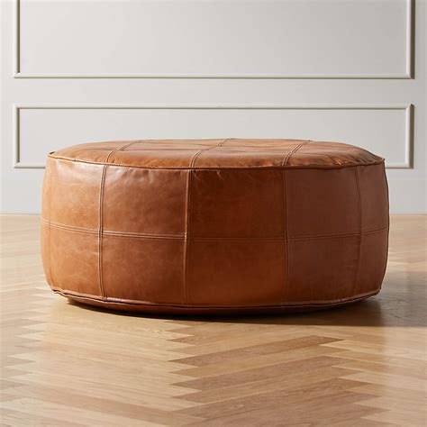 Round Saddle Leather Ottoman-Pouf + Reviews | CB2 Canada