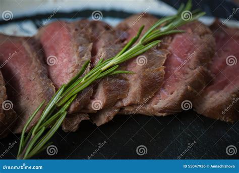 Medium Rare Cooked Beef Roast Stock Photo - Image of garlic, food: 55047936