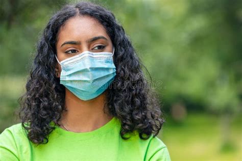 African American Female Young Woman Wearing Surgical Face Mask In Covid