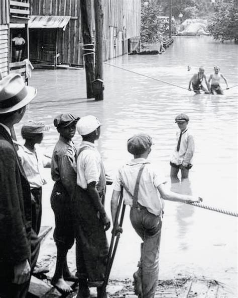 History - In Knoxville, Tennessee, July 1916, a swollen stream