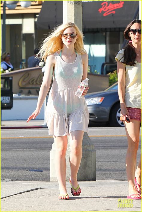 Elle Fanning Shows Bright Bikini In Sheer Dress Photo