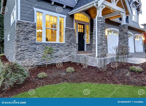 Front Covered Porch Design With Stone Columns Stock Image Image Of