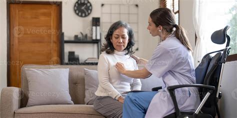 Asian Female Patient Undergoing Health Check Up While Female Doctor