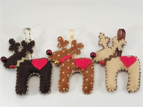 Items similar to Three Reindeer Ornaments made with felt in deep brown ...