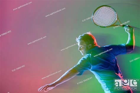 Tennis Player Swinging Racket Stock Photo Picture And Royalty Free