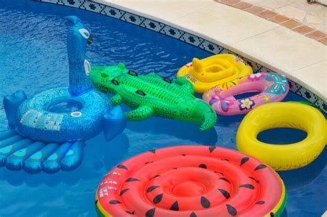 Premium Photo High Angle View Of Toys Floating On Swimming Pool