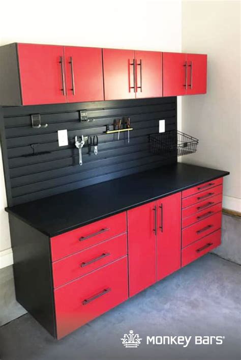 Race Day Red Cabinets paired with Black Slatwall makes for one ...