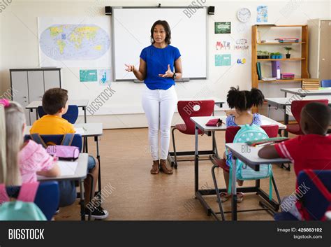 A Teacher Teaching A Class