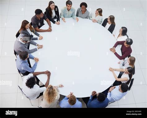 Business People Having A Meeting At Round Table Stock Photo Alamy