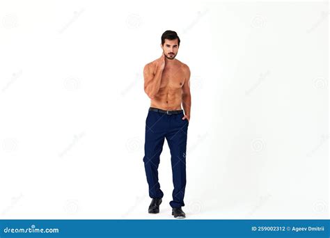 Man With Bare Torso And Prue Cubes In Business Pants Shows Full Length Nude Body Women X S