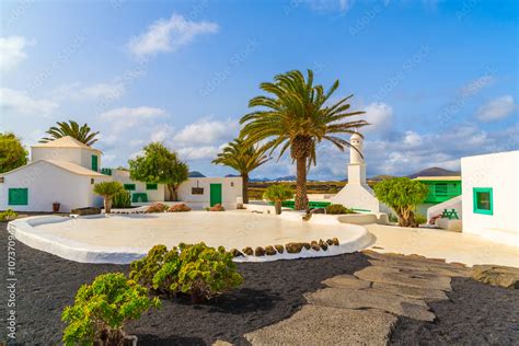 Typical Canarian Style Buildings And Tropical Plants El Campesino