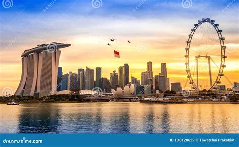 Singapore National Day Helicopter Hanging Singapore Flag Flying Over The City Stock Image