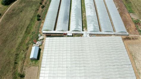 Drone Flying Over A Greenhouse With Vegetables Growing Industrial