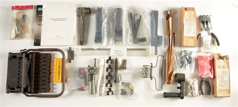 Lot Detail - LOT OF M2 .50 BROWNING MACHINEGUN PARTS AND ACCESSORIES.