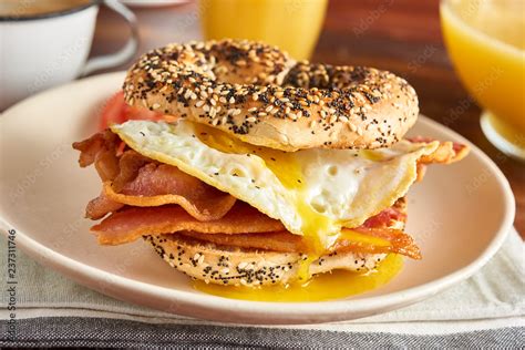 Bacon and Egg Sandwich on Bagel Stock Photo | Adobe Stock