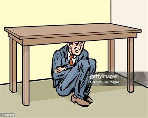 Man Hiding Under Table Photos And Premium High Res Pictures Getty Images