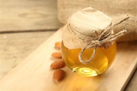 Premium Photo | Honey jar on wooden background