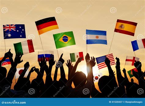 Silhouettes Of People Holding Flags From Various Countries Stock Photo ...