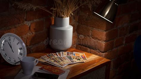 Blurred Predictions Background Tarot Cards Layout On Witch Table Stock