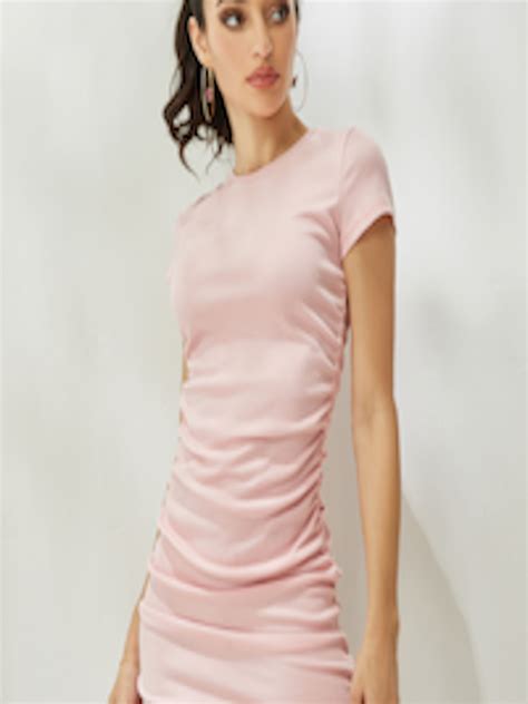 Buy Urbanic Peach Coloured Solid Ruching Bodycon Mini Dress Dresses