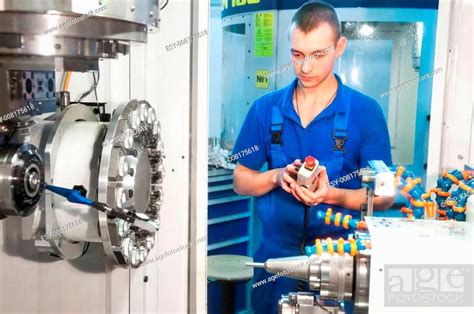 Worker Operating Cnc Machine Center Stock Photo Picture And Low