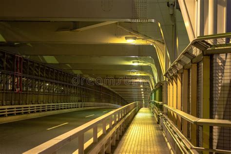 Evening Scene Of Famous Modern Architecture Inside Rainbow Bridge In