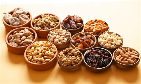 Premium Photo Dried Fruits And Mixed Nuts Healthy Foods