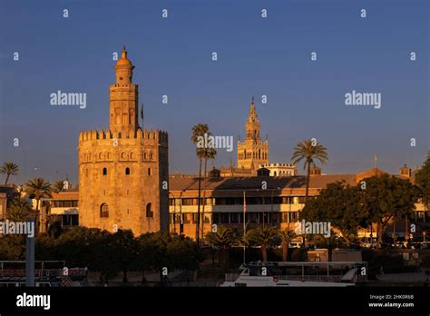 Skyline Of Seville With A View On The Golden Tower On The Quayside Of