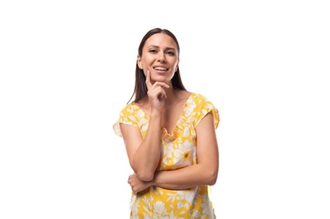 Premium Photo Year Old Brunette Woman Dressed In A Summer Outfit Looks Confidently At The Camera