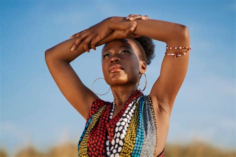 Free Photo | Woman posing in an arid environment while wearing native ...